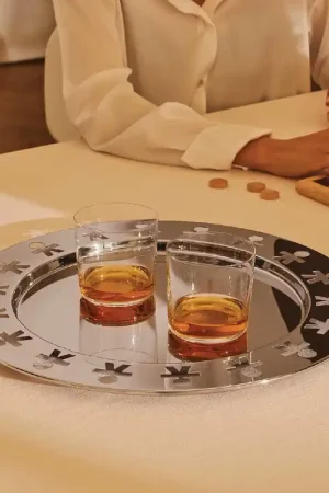 Vassoio rotondo in acciaio lucido traforato dal design moderno ed elegante Saldi