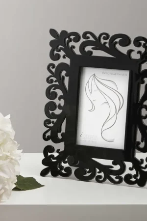 Compra Online Portafoto da tavolo piccolo in legno dal design moderno ed elegante - Foto 10x15