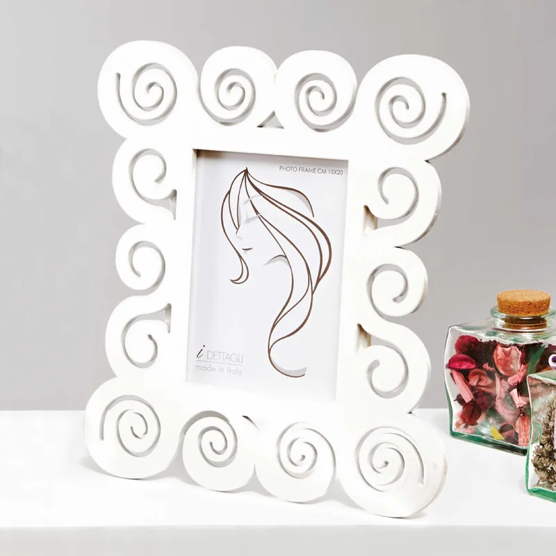 Super Prezzo Portafoto piccolo con cornice in legno dal design moderno ed elegante - Foto 10x15