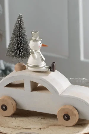 Decorazione per la tavola con macchina e pupazzo di neve Saldi