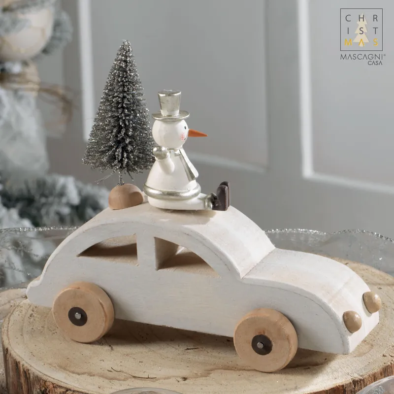 Decorazione per la tavola con macchina e pupazzo di neve Saldi